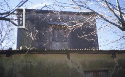 Ex casa de López Arias, ventana con rueda