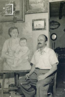 César Carlos Bustos junto a su pintura que retrata a su esposa e hijo

ver en galería: P183