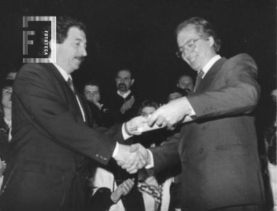 Miguel Ángel Carraro, Director del Coro Estable, y Rubén Yulió