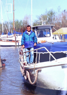 Retrato hombre en barco
