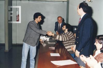 Daniel Viglione. Al fondo, Alfredo Omar Busch