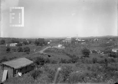 Paisaje campestre con ranchos
