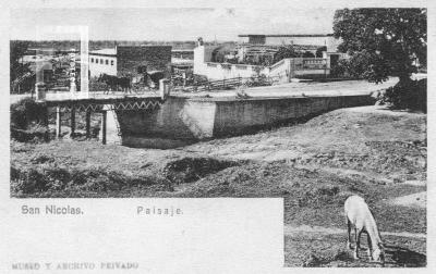 Puente //Huidobro//, calle Sarmiento pasando Alberdi